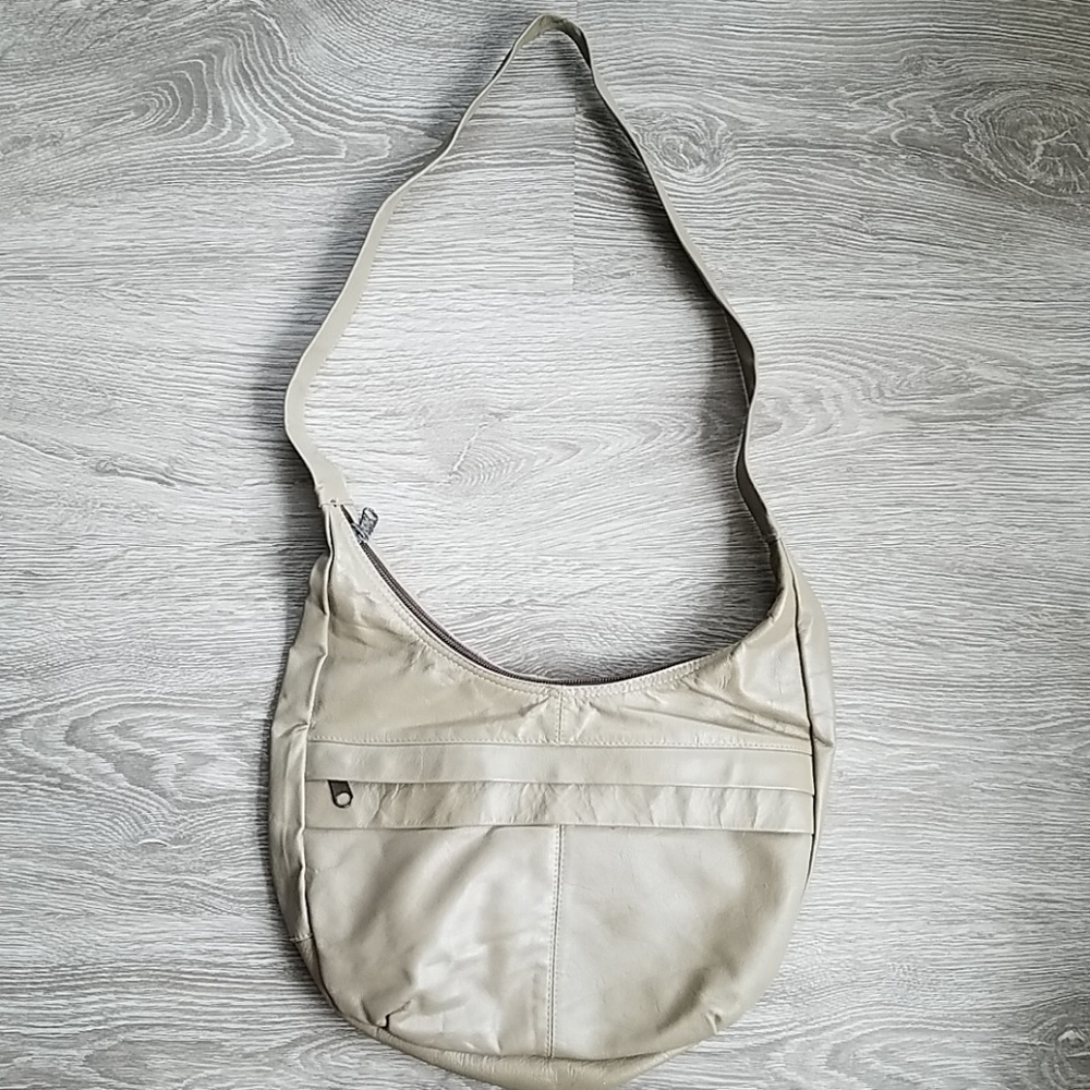 Vintage beige tan leather handbag